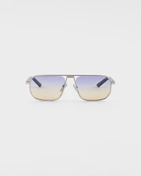 Sunglasses with the iconic metal plaque