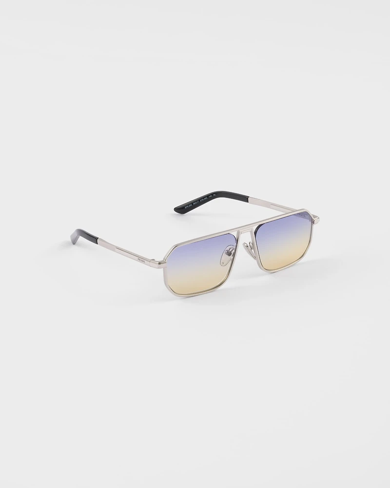 Sunglasses with the iconic metal plaque