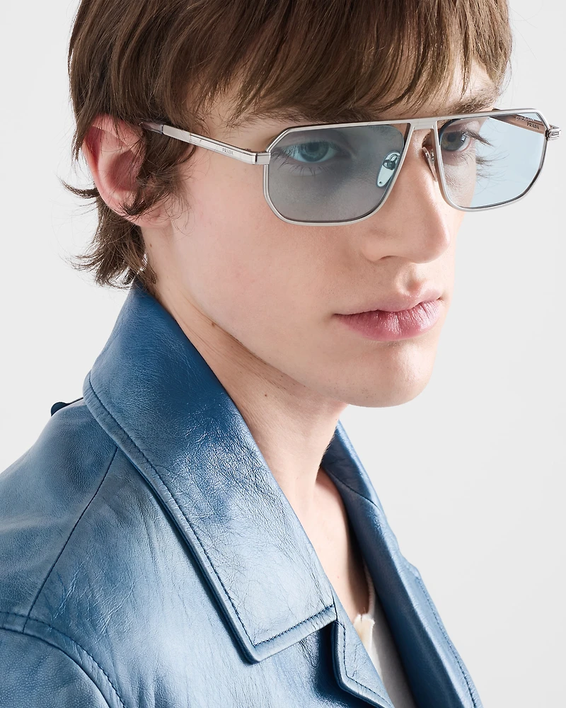Sunglasses with the iconic metal plaque