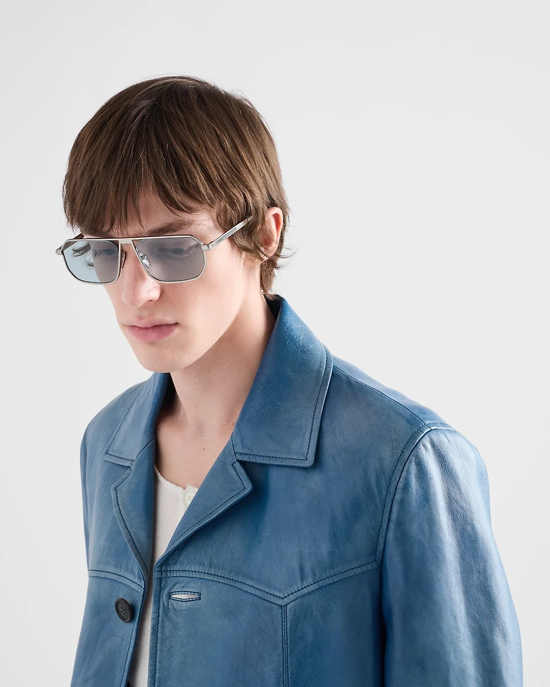 Sunglasses with the iconic metal plaque