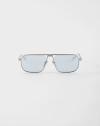 Sunglasses with the iconic metal plaque