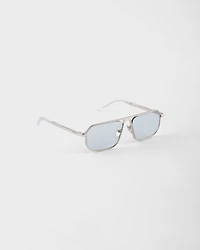 Sunglasses with the iconic metal plaque