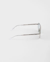 Sunglasses with the iconic metal plaque