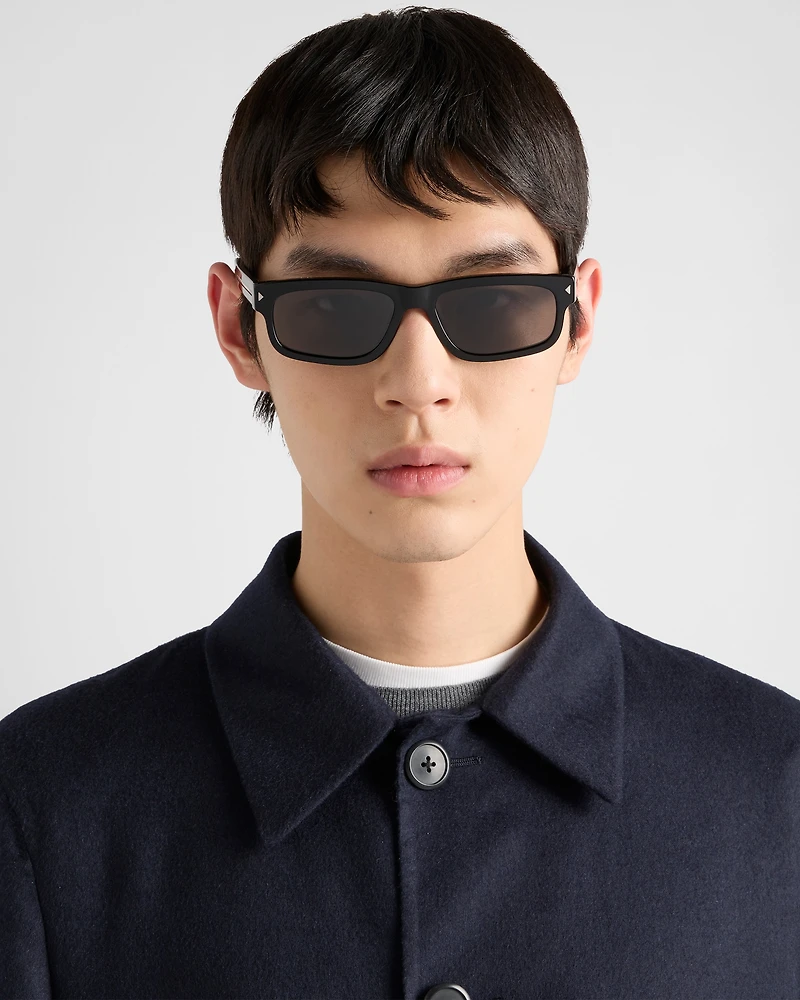 Sunglasses with the iconic metal plaque