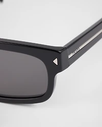 Sunglasses with the iconic metal plaque