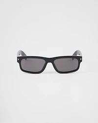 Sunglasses with the iconic metal plaque