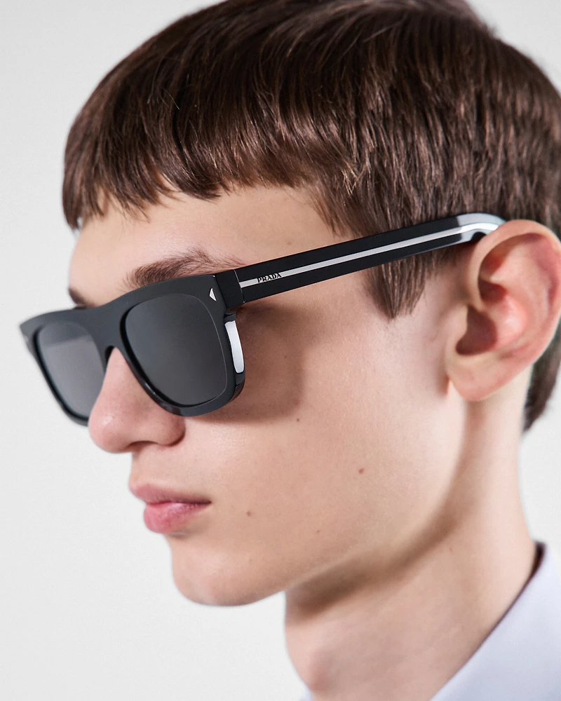 Sunglasses with the iconic metal plaque