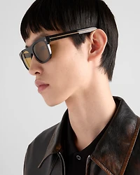 Sunglasses with the iconic metal plaque