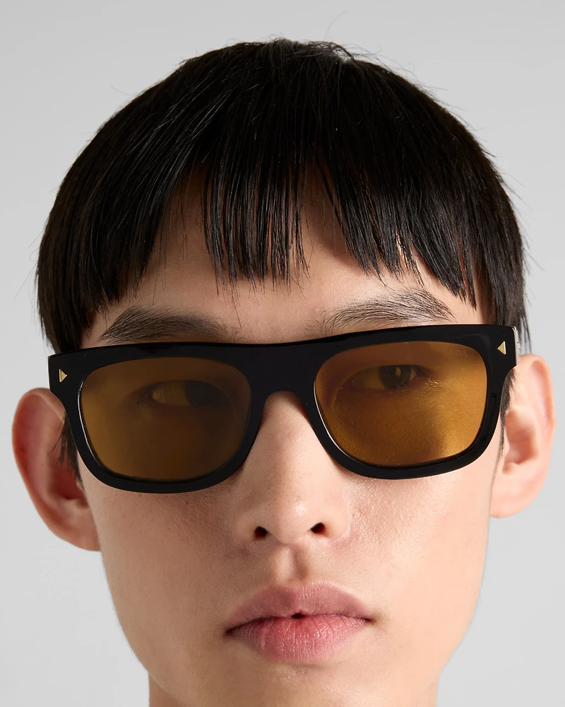 Sunglasses with the iconic metal plaque