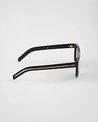 Sunglasses with the iconic metal plaque