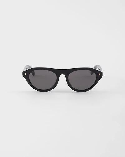 Prada sunglasses with the iconic metal plaque
