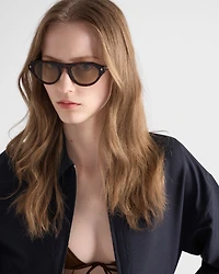 Prada sunglasses with the iconic metal plaque