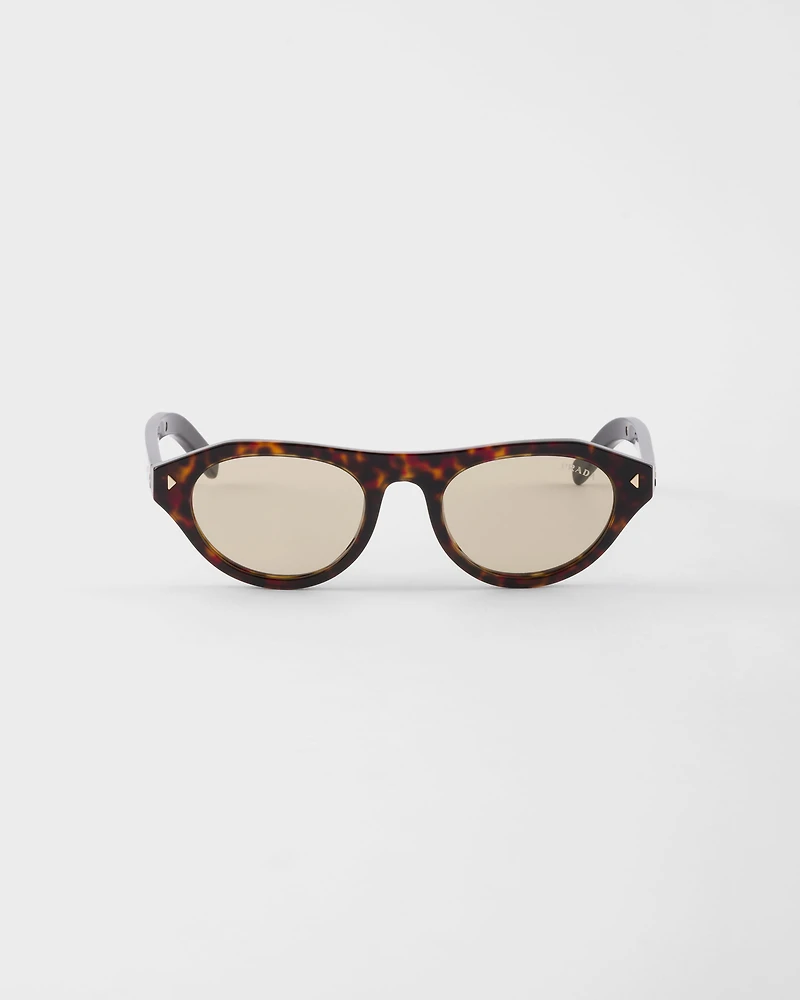 Prada sunglasses with the iconic metal plaque