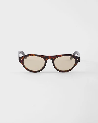 Prada sunglasses with the iconic metal plaque