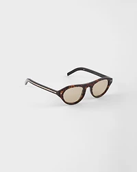 Prada sunglasses with the iconic metal plaque