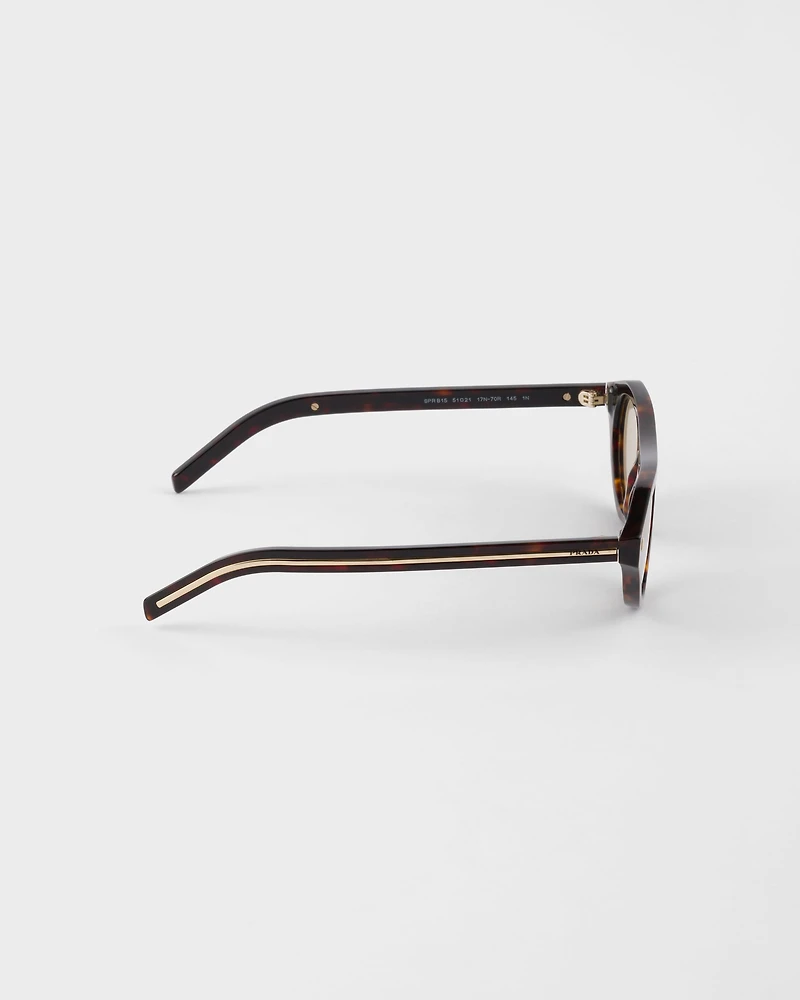 Prada sunglasses with the iconic metal plaque