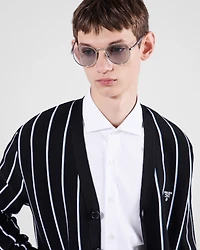 Sunglasses with the iconic metal plaque