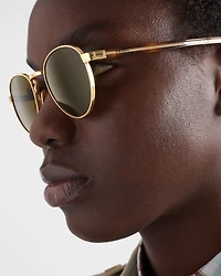 Sunglasses with the iconic metal plaque
