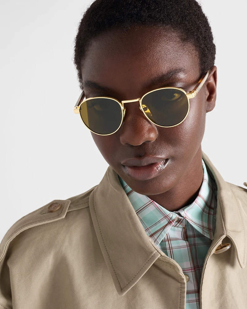 Sunglasses with the iconic metal plaque