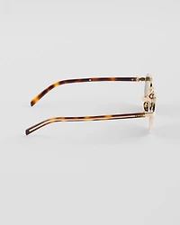 Sunglasses with the iconic metal plaque