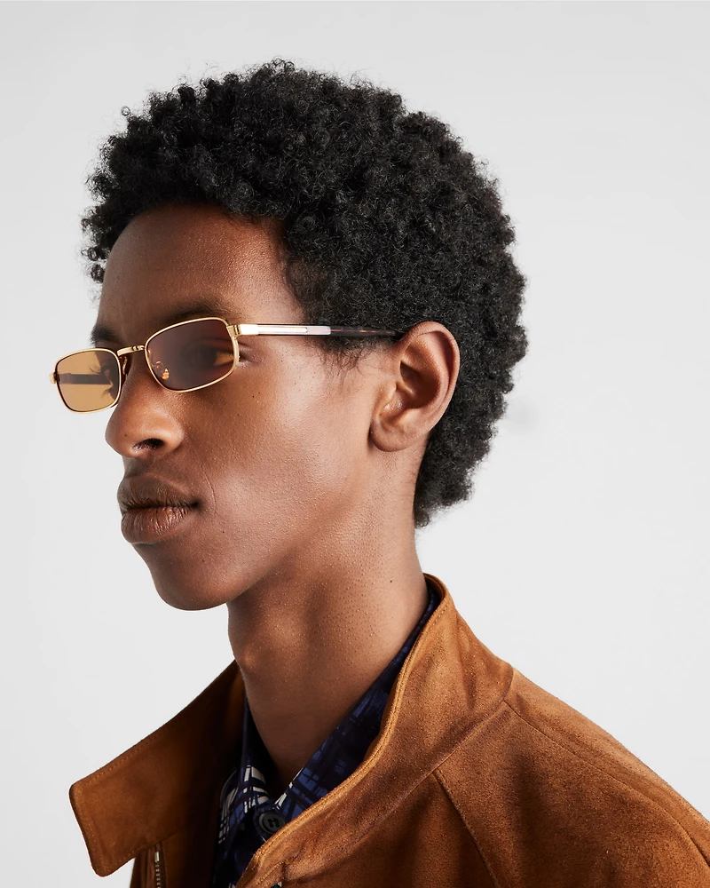 Sunglasses with the iconic metal plaque