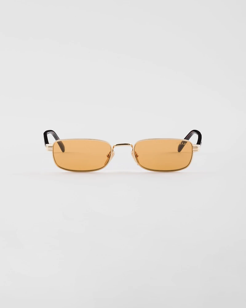 Sunglasses with the iconic metal plaque