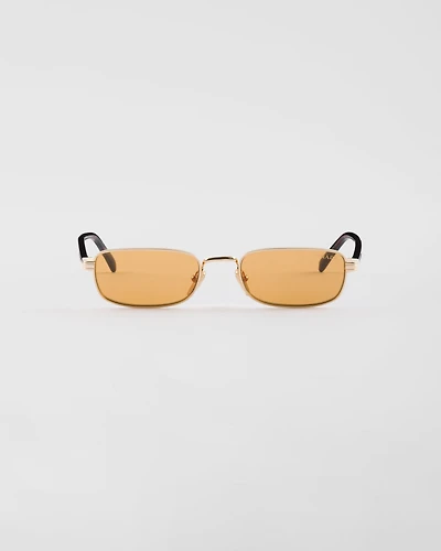 Sunglasses with the iconic metal plaque