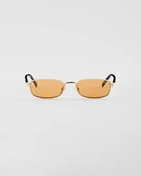 Sunglasses with the iconic metal plaque