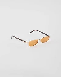 Sunglasses with the iconic metal plaque
