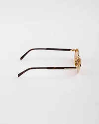 Sunglasses with the iconic metal plaque