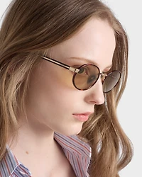 Prada sunglasses with the iconic metal plaque