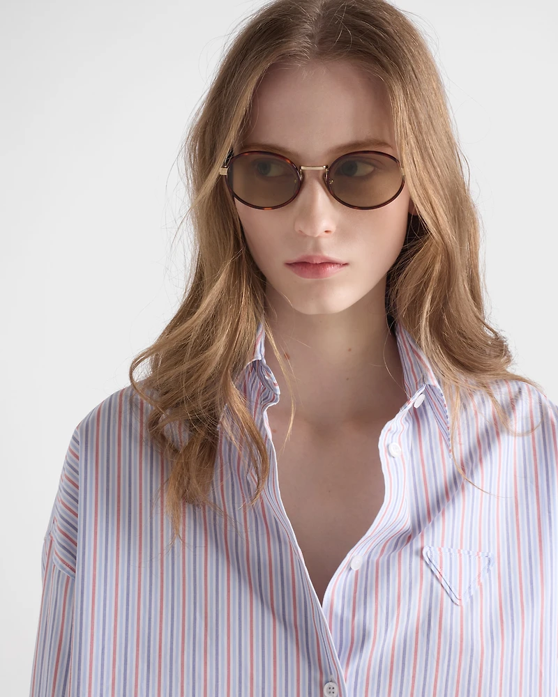 Prada sunglasses with the iconic metal plaque