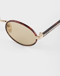 Prada sunglasses with the iconic metal plaque