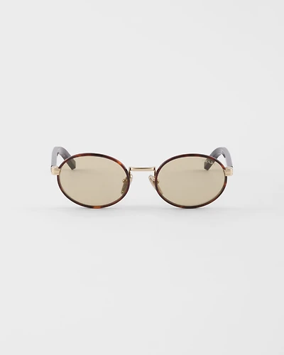 Prada sunglasses with the iconic metal plaque