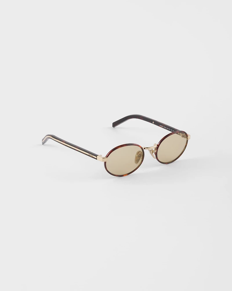 Prada sunglasses with the iconic metal plaque