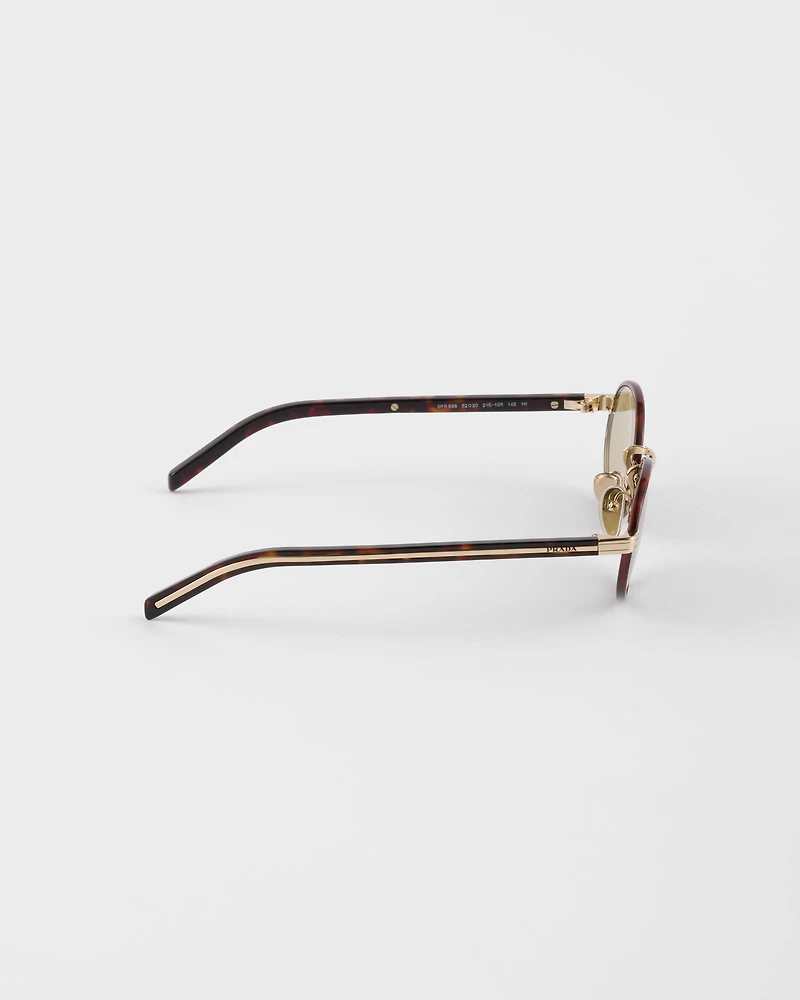 Prada sunglasses with the iconic metal plaque