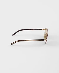 Prada sunglasses with the iconic metal plaque