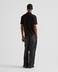 Piqué polo shirt with Re-Nylon details