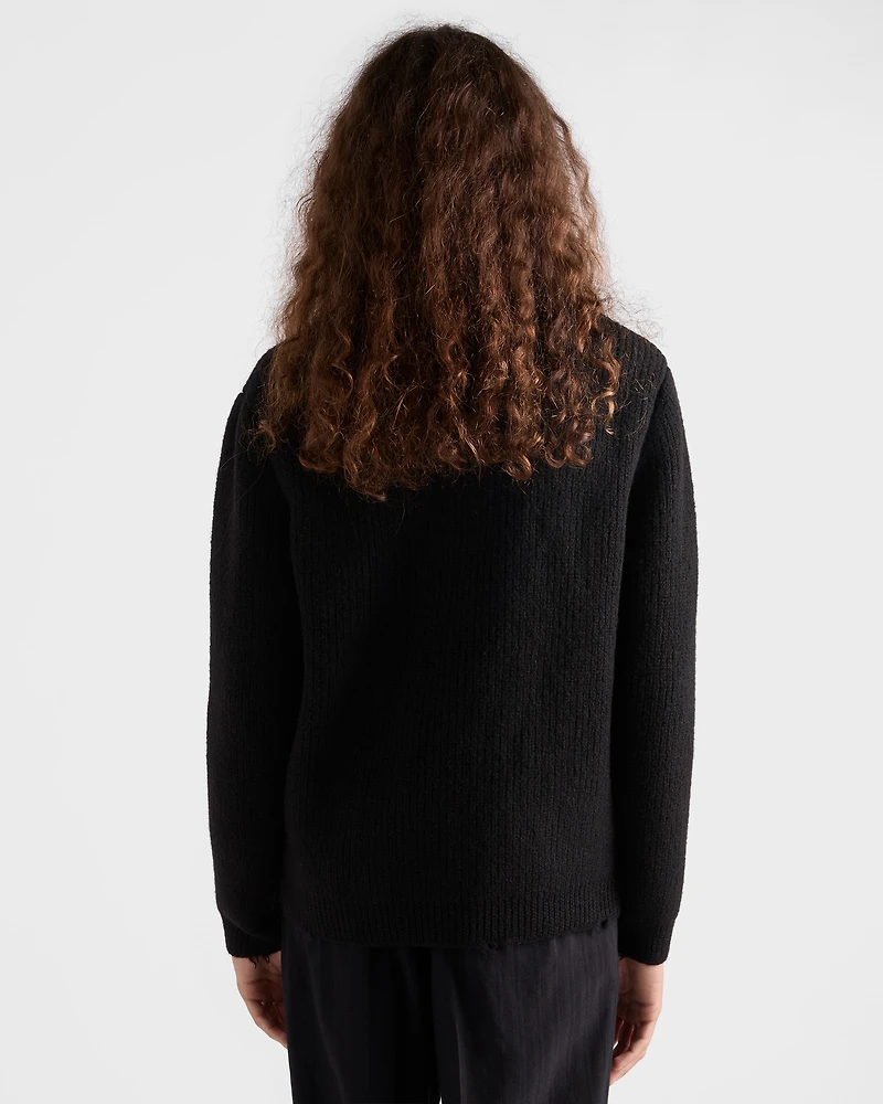 Wool crew-neck sweater with pendant