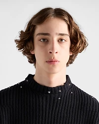 Wool crew-neck sweater with fringe and studs