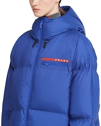 Oversized technical Re-Nylon down jacket