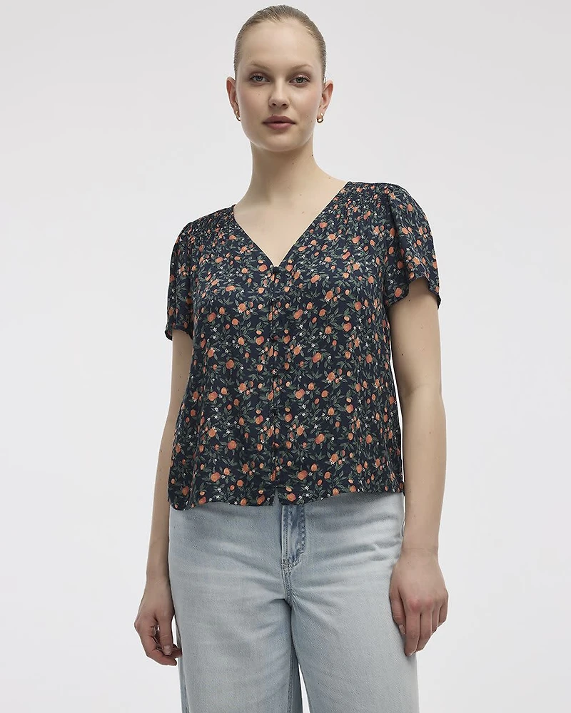 Blouse à col V et manches courtes à volants