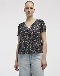 Blouse à col V et manches courtes à volants