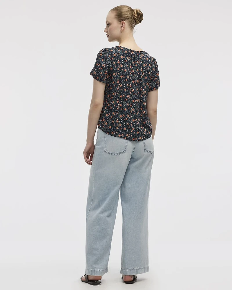 Blouse à col V et manches courtes à volants