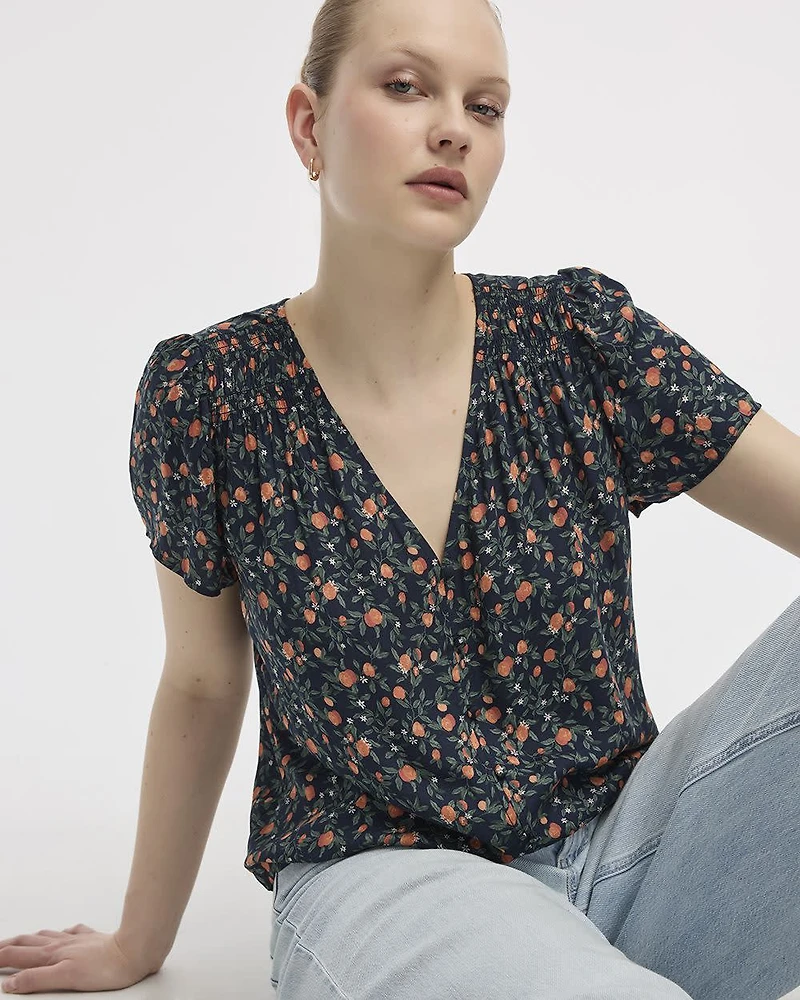 Blouse à col V et manches courtes à volants