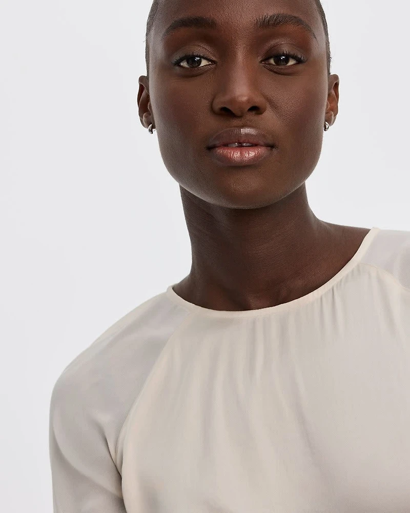 Blouse bimatière à manches courtes et col rond