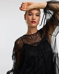 Mini-robe ballon en tulle à manches longues