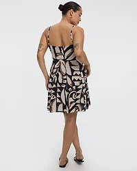 Robe courte à boutonner sans manches