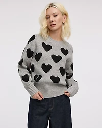 Pull à manches longues et col rond avec coeurs