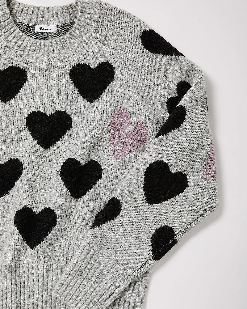 Pull à manches longues et col rond avec coeurs